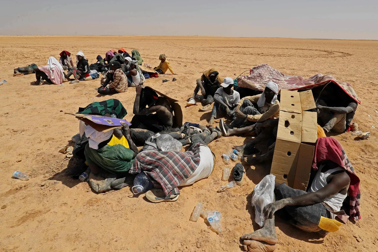 Foto van migranten in de woestijn
