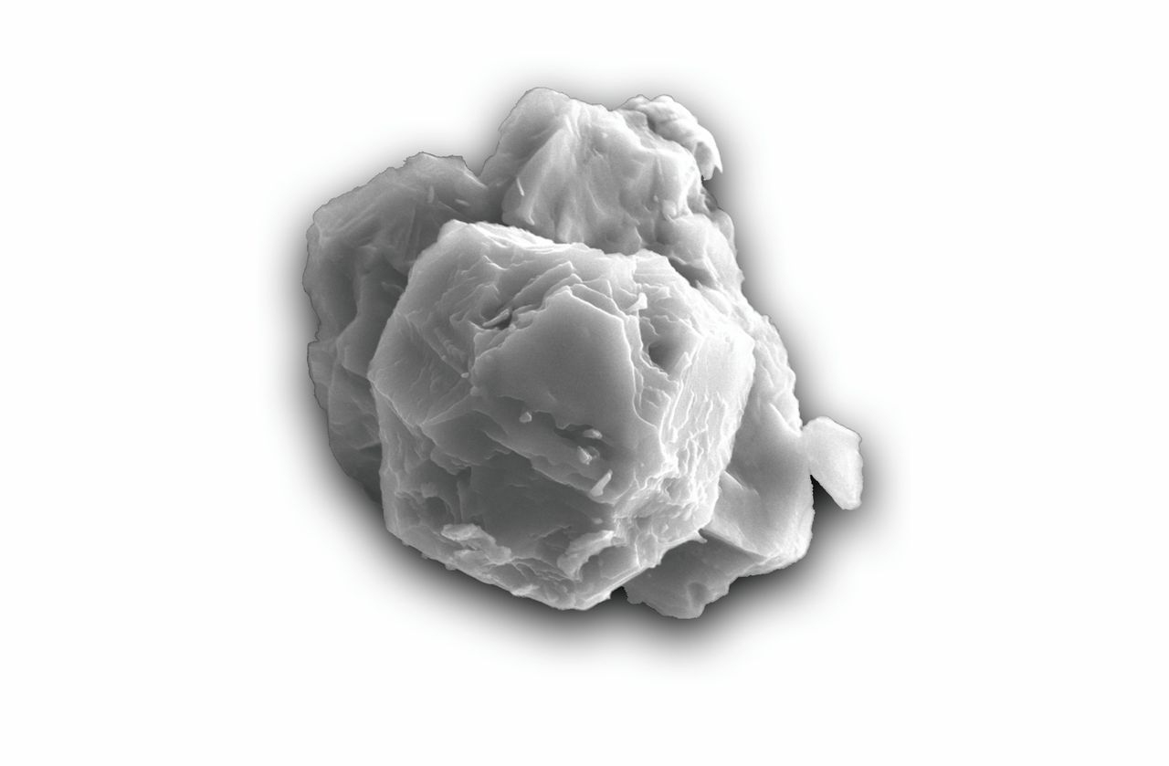 Elektronenmicroscoopopname van een ‘presolaire’ korrel in de Murchison-meteoriet. De korrel heeft een doorsnede van 8 micrometer (duizendste millimeter).