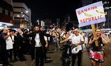 Demonstranten betogen  op 17 mei tijdens een protestmars in Tel Aviv tegen de eisen van de ultraorthodoxe gemeenschap bij de onderhandelingen over de Israëlische begroting.