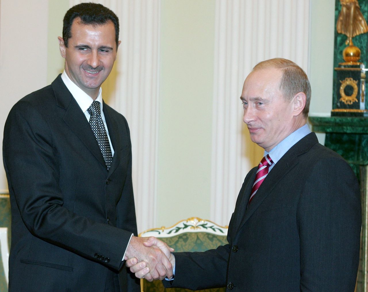 De Syrische president Assad en zijn Russische ambtgenoot in Moskou
