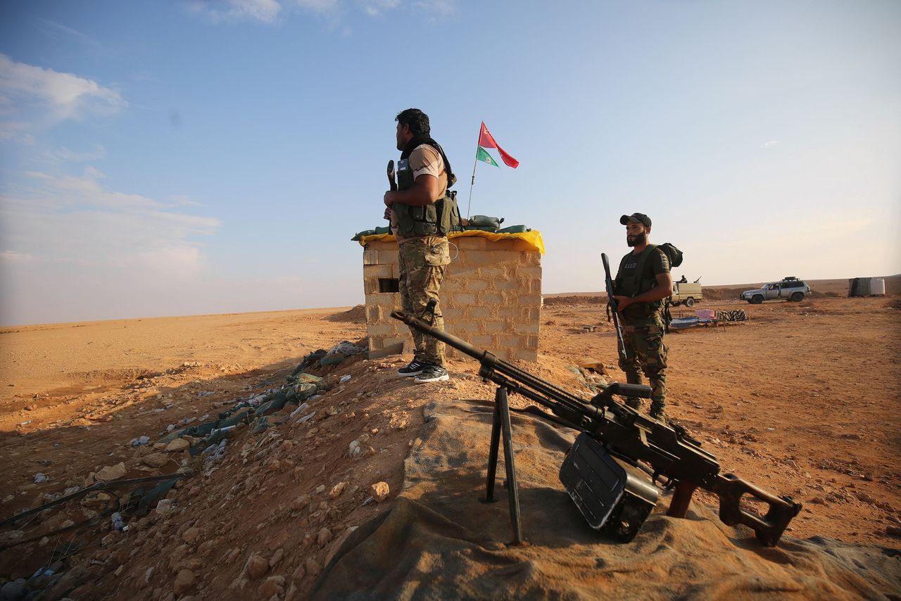 Leden van een pro-Iraanse militie uit Irak in het oosten van Syrië, beeld uit 2018.