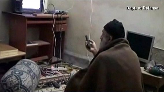 This framegrab from an undated video released by the US Department of Defense on May 7, 2011, reportedly show Al-Qaeda leader Osama bin Laden watching television at his compound in Abbottabad, Pakistan. According to the Defense Department, the video was seized from the compound during a May 1 operation by US special forces in which bin Laden was killed. = RESTRICTED TO EDITORIAL USE - MANDATORY CREDIT "AFP PHOTO / US Department of Defense" - NO MARKETING NO ADVERTISING CAMPAIGNS - DISTRIBUTED AS A SERVICE TO CLIENTS =