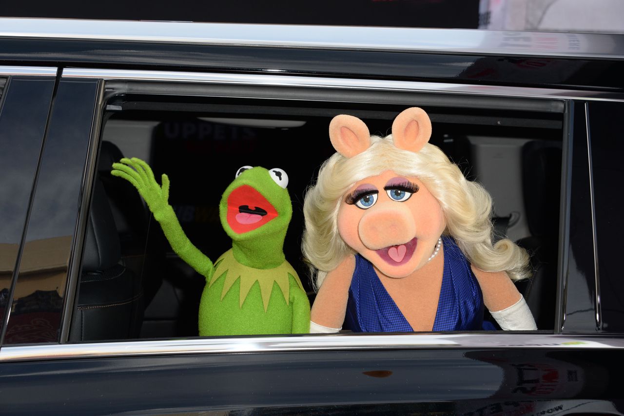 Kermit de Kikker en Miss Piggy in betere tijdens tijdens de première van hun laatste film Muppets Most Wanted.