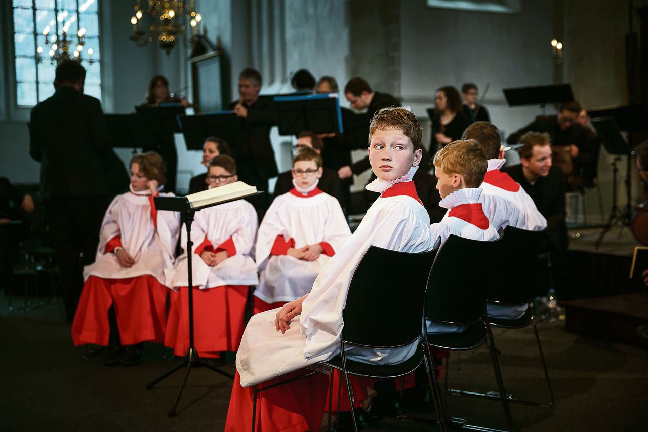 Palmzondag: het Kampen Boys Choir en De Nederlandse Bachvereniging repeteren in de Grote Kerk te Naarden Foto Olivier middendorp