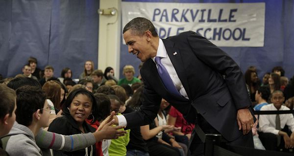 President Barack Obama reaches to shake hands with 8th graders at Parkville Middle School and Center of Technology, in Parkville, Md., Monday, Feb., 14, 2011. (AP Photo/Carolyn Kaster)