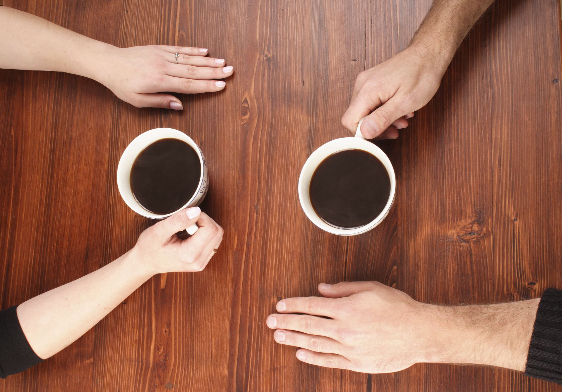 The keys were on the table. Hand on Table. Holding hands across the Table. People change hands on the Table. Hand at Table.