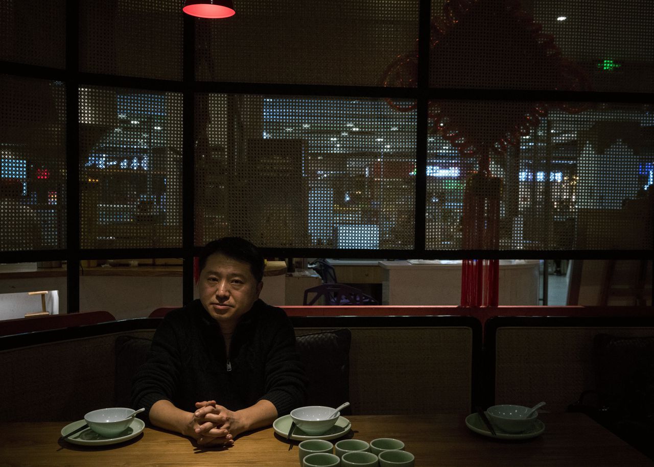 China arrests two investigative journalists