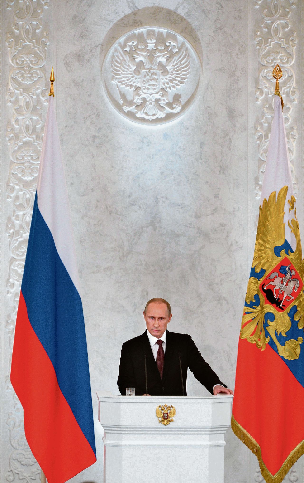 President Vladimir Poetin gisteren tijdens zijn toespraak in het Kremlin tot parlementariërs en andere hoge gasten over de Krim.
