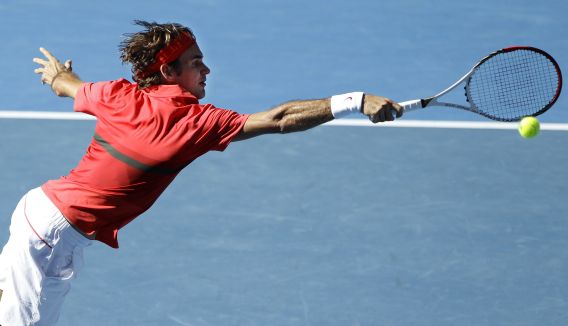 during their quarterfinal at the Australian Open tennis championship, in Melbourne, Australia, Tuesday, Jan. 24, 2012. (AP Photo/Sarah Ivey)