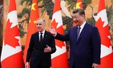 De Canadese premier Mark Carney en de Chinese president Xi Jinping vrijdag in Beijing.  