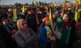 In Qasmishli in northeastern Syria, supporters follow the explanation of PKK founder Öcalan that was passed on through a delegation of the pro-Kurdish DEM party. 