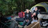 Homeless Polish Boguslaw (L) and Agatha (R) are sitting in front of their tent under a viaduct near the Scheveningse Bosjes.
