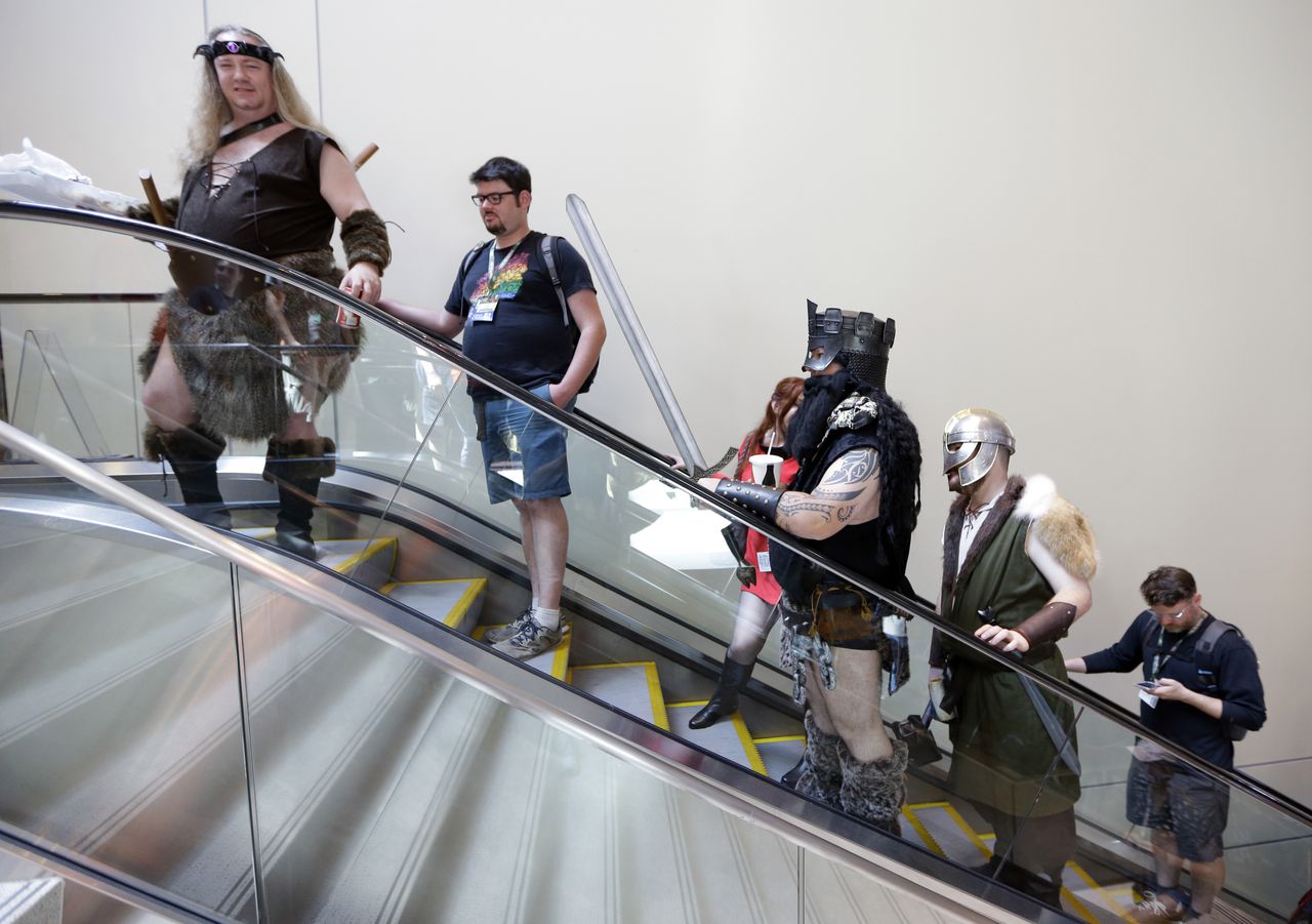 Bezoekers tijdens een gaming convention in Indianapolis. Foto Michael Conroy / AP