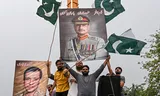 Pakistani demonstrators carry images of army leader Asim Munir during an anti-Indian protest last Sunday in Lahore. Photo Arif Ali / AFP Photo Arif Ali / AFP 