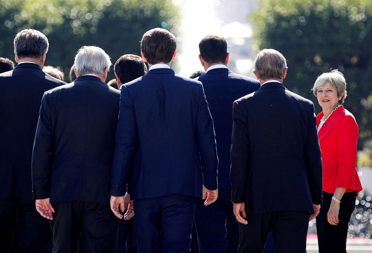 De Britse premier Theresa May arriveert voor een groepsfoto tijdens een Europese top in Salzburg in 2018.