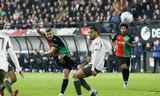 NEC-aanvaller Bryan Linssen schiet op doel tijdens de halve finale van de KNVB-beker tegen PSV