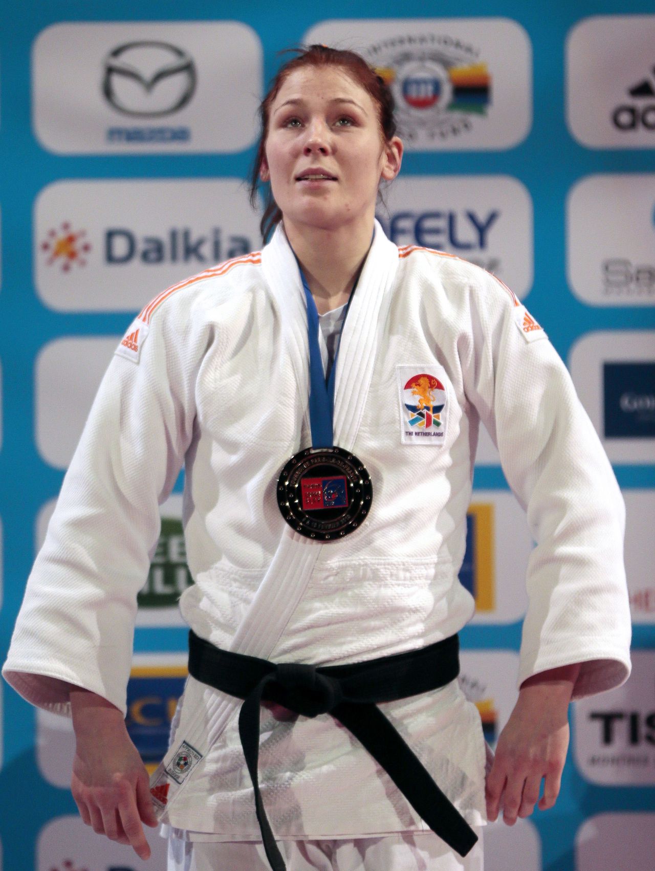 Kim Polling of the Netherlands poses on the podium on February 10, 2013 after winning the Women -70Kg final of the Paris International Judo tournament, part of the Grand Slam, at the Palais Omnisports de Paris-Bercy (POPB) in Paris. AFP PHOTO / JACQUES DEMARTHON