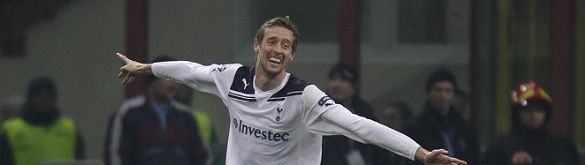 Tottenham Hotspur forward Peter Crouch celebrates after scoring during a Champions League, round of 16, first leg soccer match between AC Milan and Tottenham Hotspur at the San Siro stadium in Milan , Italy, Tuesday, Feb. 15, 2011. (AP Photo/Luca Bruno)
