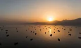 FILE PHOTO: A drone view of vessels anchored in the Strait of Hormuz as seen from Musandam, Oman, June 3, 2026. REUTERS/Stringer/File Photo