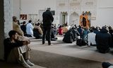 Vrijdagmiddaggebed voorafgaand aan de ramadam in moskee Nour al Houda in Arnhem. 