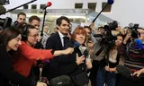 Gisèle Pelicot leaves the Avignon court with her lawyers on Thursday, where her ex-husband Dominique is on trial.
