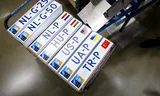 License plates for the delegations of the Netherlands, Hungary, the United States, Ukraine and Turkey are ready for use in the run-up to the NATO summit. Photo Sem van der Wal/ANP 