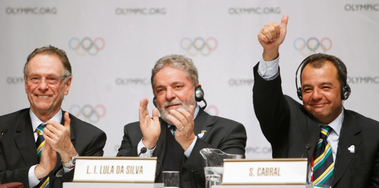Carlos Arthur Nuzman, Luiz Inacio Lula da Silva en Sergio Cabral vieren in 2009 dat ze de spelen hebben binnengehaald.