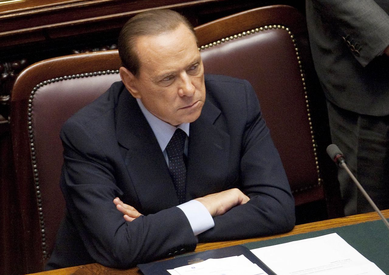De Italiaanse premier Silvio Berlusconi eerder deze maand. Hij zou volgens een geheime afspraak rond de jaarwisseling aftreden.