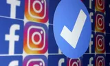 Een blauw verificatievinkje en de logo’s van Facebook en Instagram – beide social mediaplatformen vallen onder het bedrijf Meta.