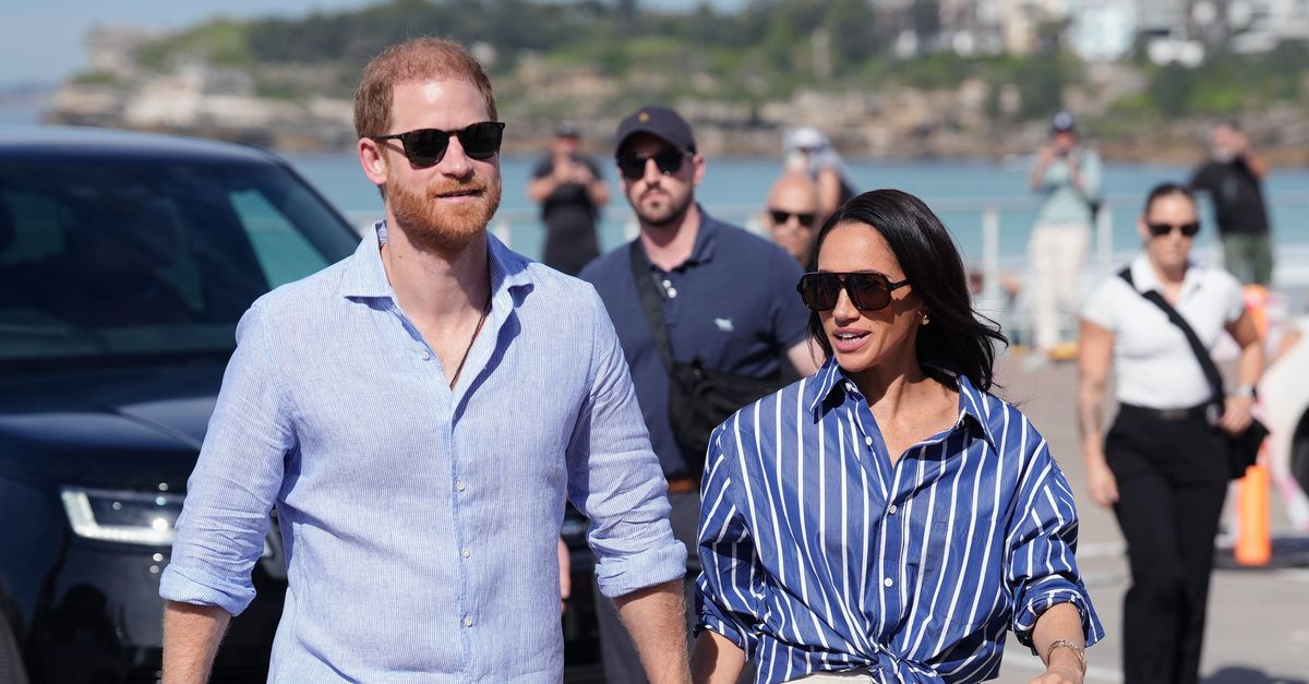 FILE – Prince Harry, and Meghan, the Duke and Duchess of Sussex, arrive for an event, during a visit to Bondi Beach