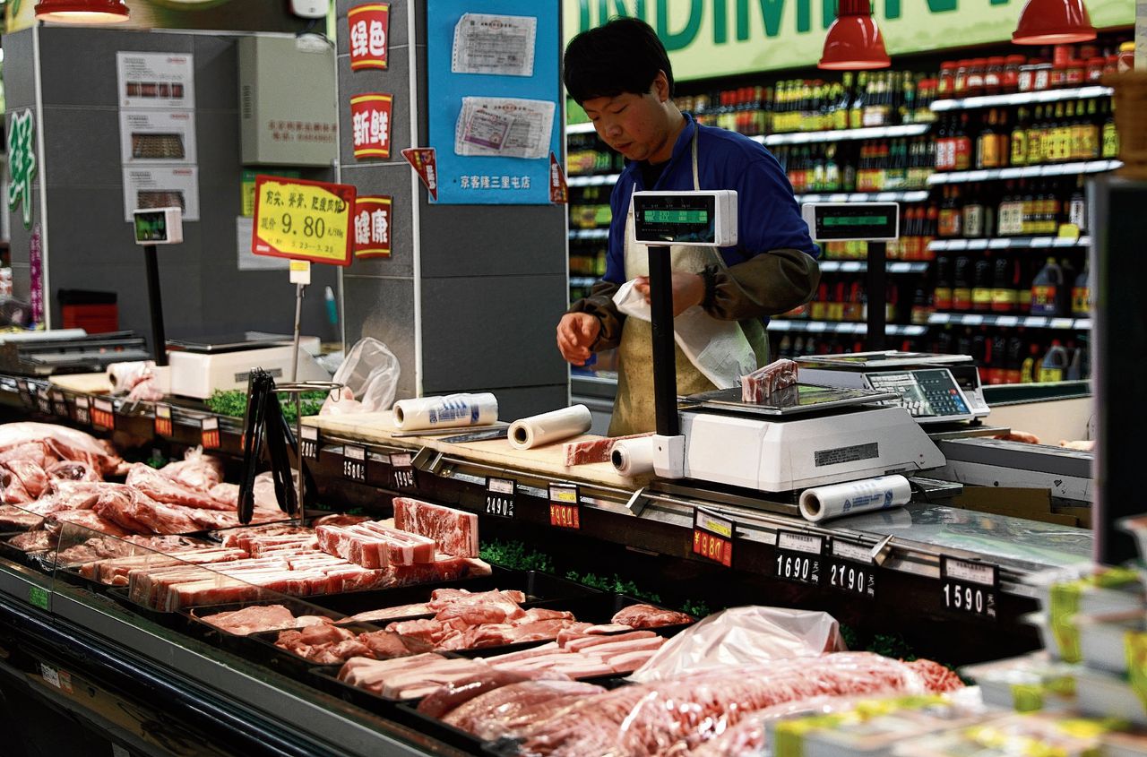 China dreigt de VS met heffingen op Amerikaans varkensvlees, als tegenmaatregel voor Amerikaanse heffingen op Chinees staal.