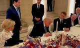 TOPSHOT – This screengrab from videofootage made available on June 18, 2026, from the X account of Deputy Chief of Staff at The White House Dan Scavino shows US President Donald Trump (C) next to France’s President Emmanuel Macron (R), his wife Brigitte Macron (L), US Secretary of State Marco Rubio and France’s Foreign Affairs Minister Jean-Noel Barrot during the signing of a deal with Iran to end the Middle East war, inside Chateau de Versailles, in Versailles southwest of Paris on June 17, 2026. (Photo by @Scavino47 / AFP) / XGTY – RESTRICTED TO EDITORIAL USE – MANDATORY CREDIT ?  AFP PHOTO / @Scavino47  ? – NO MARKETING NO ADVERTISING CAMPAIGNS – DISTRIBUTED AS A SERVICE TO CLIENTS – NO ARCHIVE