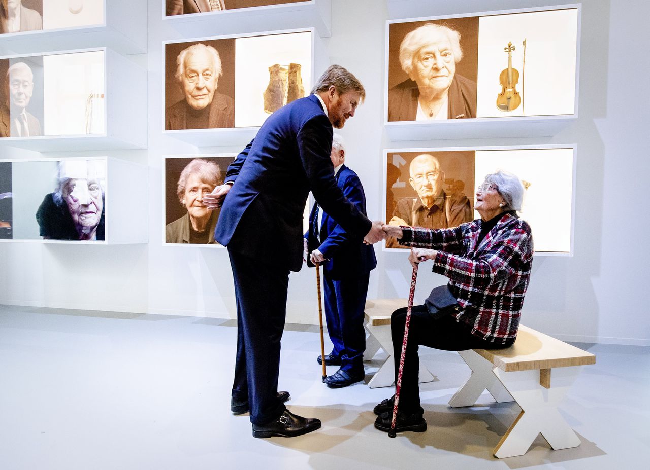 Joke Folmer meets King Willem-Alexander at the reopening of the National Monument Camp Vught, 2019.