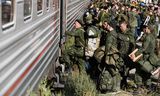 Russische rekruten nemen donderdag de trein in Prudboi, in de regio Volgograd, na te zijn opgeroepen zich te voegen bij de Russische legereenheden die in Oekraïne strijden.