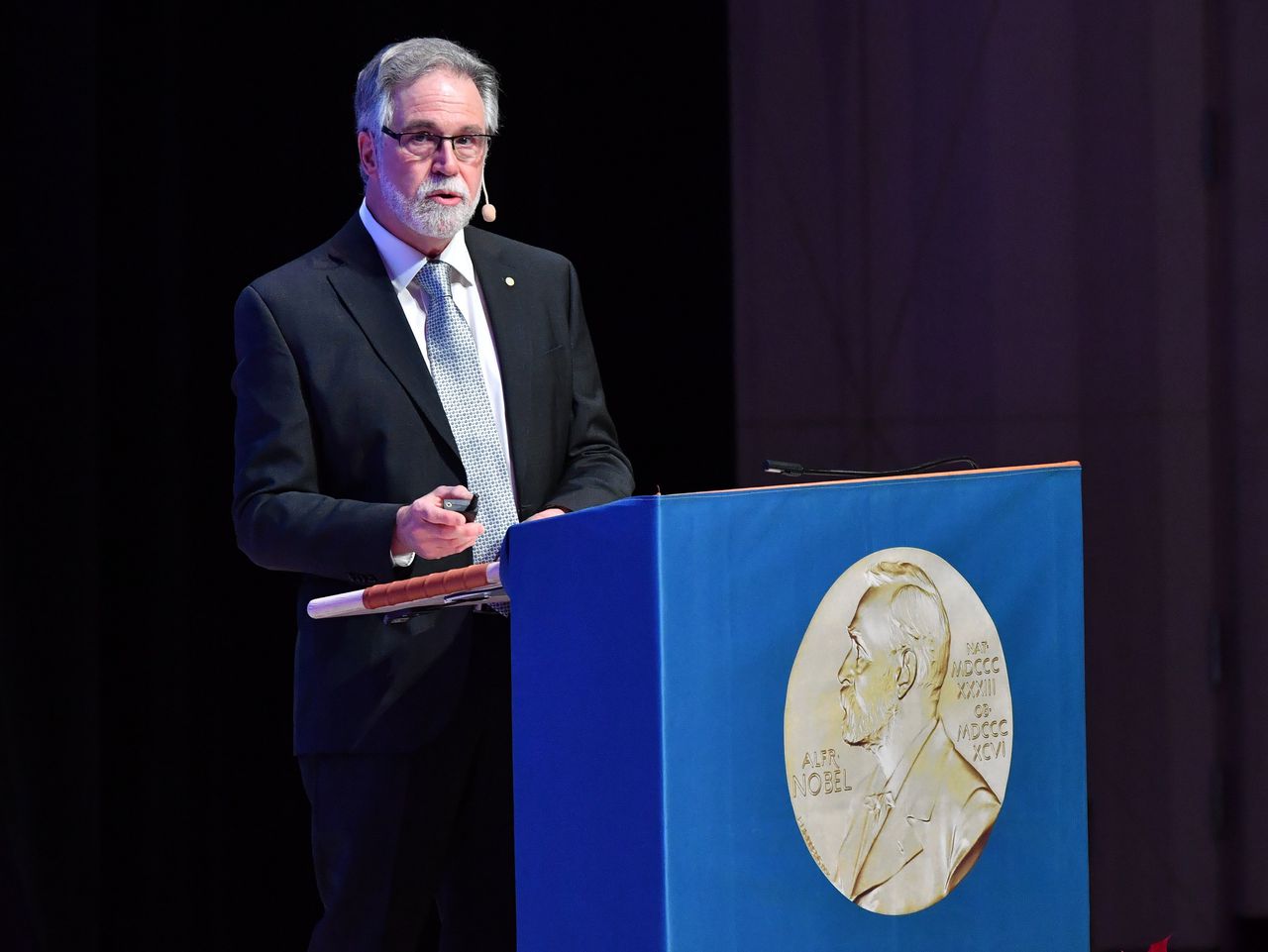 Geneticus Gregg Semenza tijdens zijn Nobellezing in 2019.