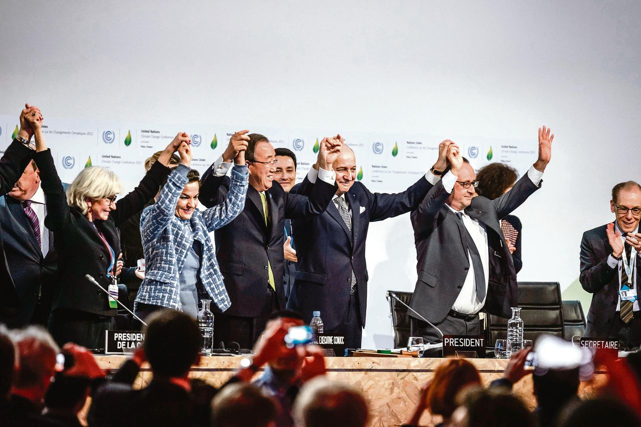 Blijdschap over het akkoord op de klimaattop in Parijs, december 2015.