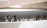 Toeslagenouders op de publieke tribune tijdens een debat in de Tweede Kamer over het proces van afhandeling van compensatie van  schade in de Toeslagenaffaire.