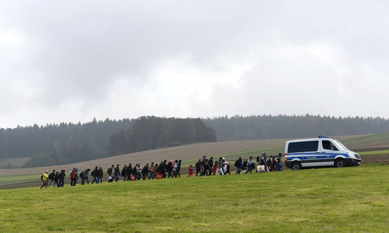 Migranten bij de Oostenrijkse-Duitse grens.