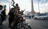 Syrische rebellen vieren de val van het Assad-regime in Damascus.