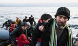 Vluchtelingen en migranten gaan begin maart aan land op het Griekse eiland Lesbos.