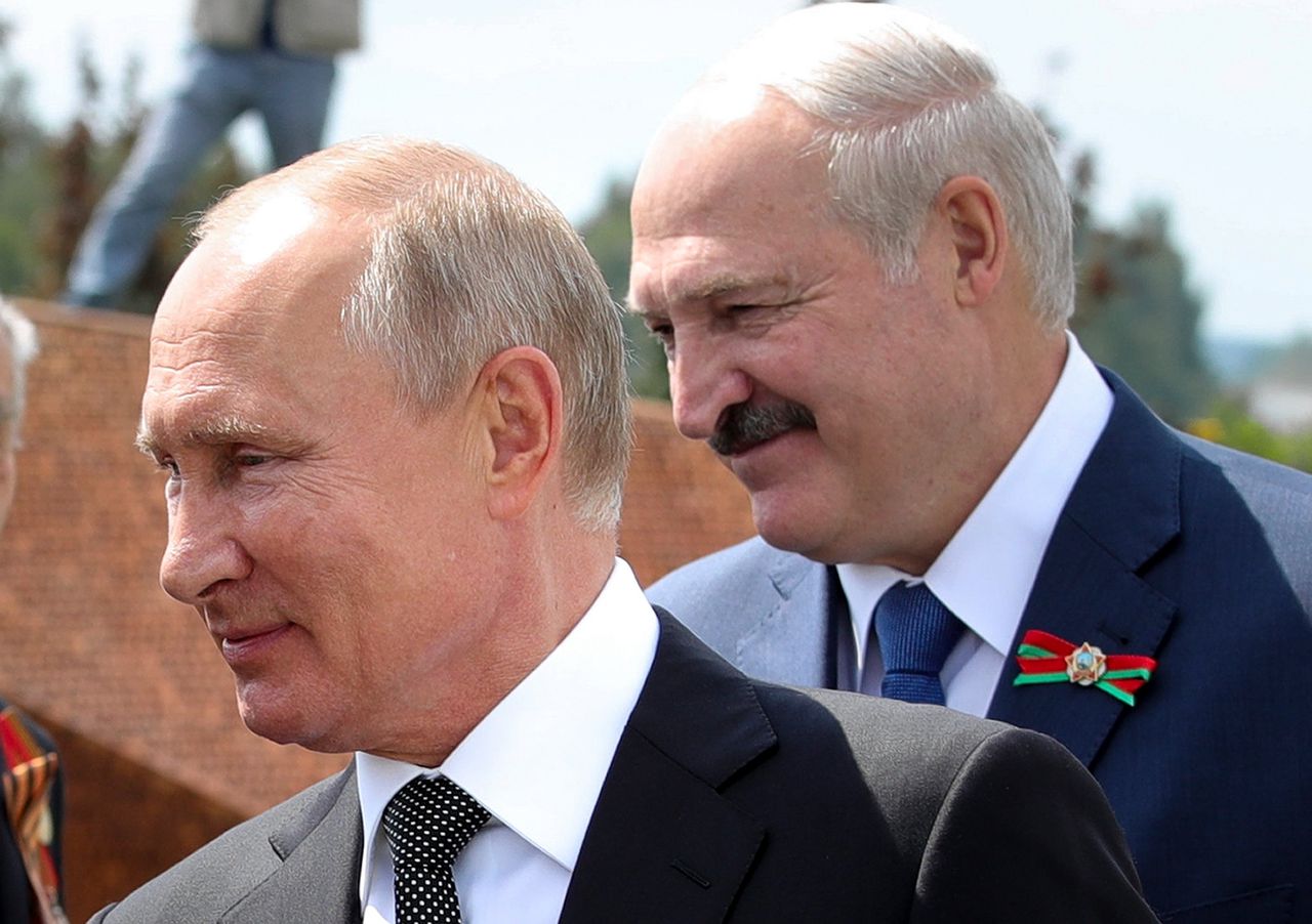 De Russische president Poetin (links) en de Wit-Russische president Loekasjenko.