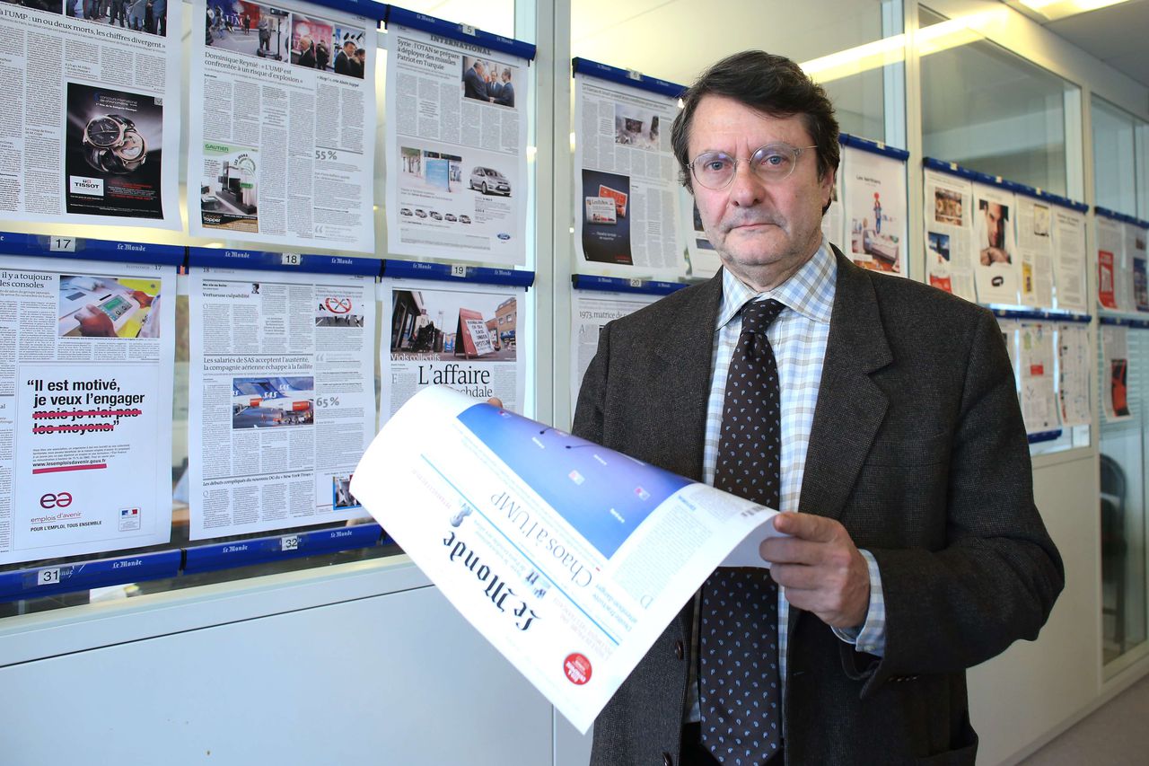 (FILES) This photo taken on November 19, 2012, in Paris, shows Erik Izraelewicz, the director of the French daily newspaper 'Le Monde', as he poses for a photograph in the paper's headquarters during the wrap-up for the day's edition. Izraelewicz, 58, passed away abruptly late on November 27, 2012, in a hospital in Paris after having collapsed earlier in the day amongst staff at the 'LeMonde' headquarters. During his life dedicated to journalism, Izraelewicz initially worked primarily in the economic service of newspapers before becoming involved as a director and manager at other French newspapers, such as 'Les Echos' and 'la Tribune', as well as with the magazines 'Telerama' and 'Courier International'. AFP PHOTO / THOMAS SAMSON