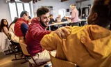 Ali Hosseinzadeh during a lesson by Sanne Terlouw at the asylum seekers' school. Photo Dieuwertje Bravenboer