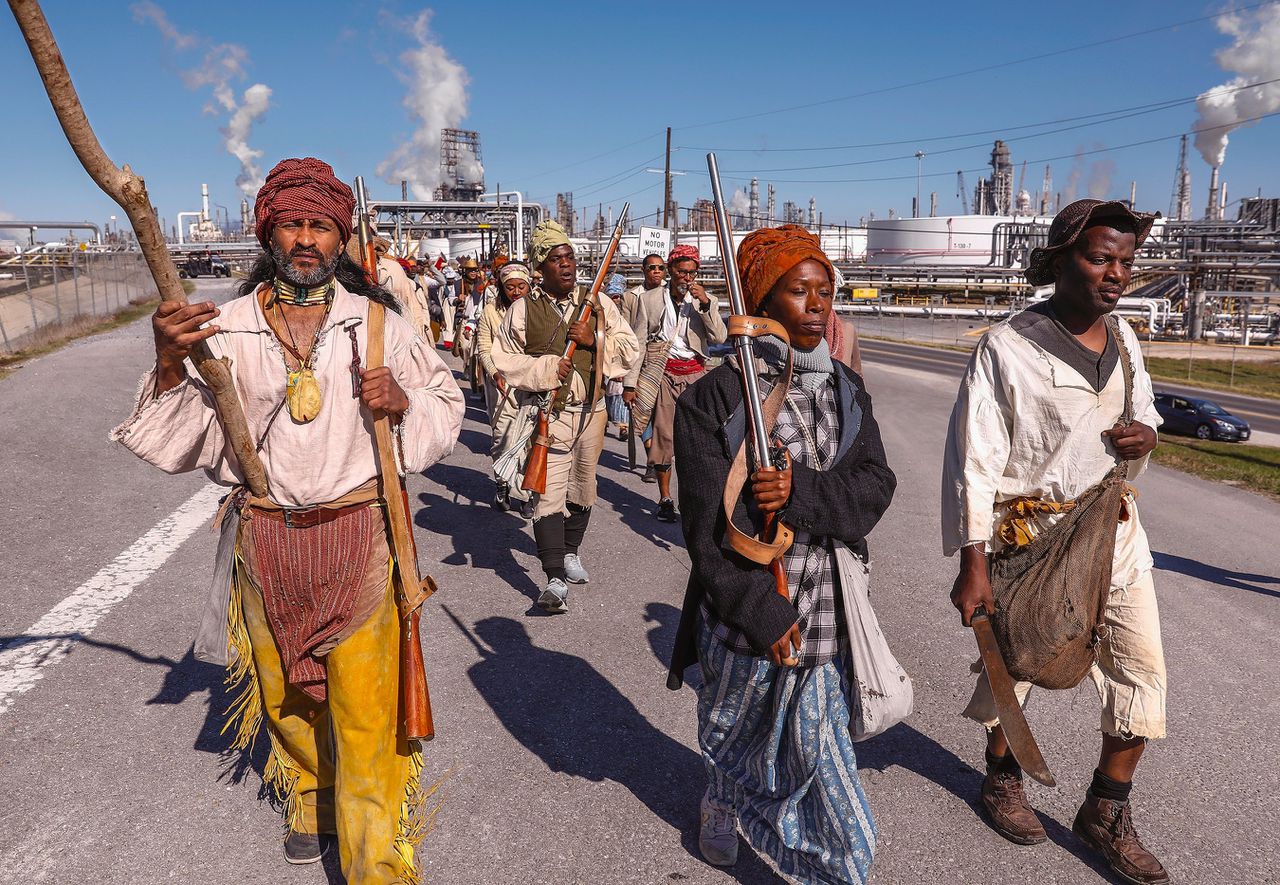 Photo of Dread Scott's Slave Rebellion Reenactment, a performance about the march in 1811 of several hundred enslaved people in New Orleans, who wanted to establish an autonomous state.