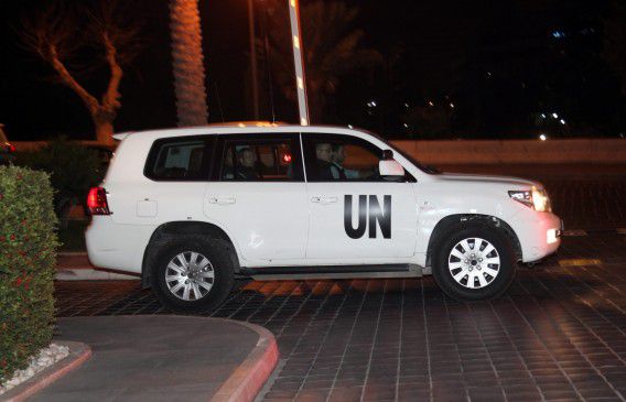 Een foto uit oktober vorig jaar: een auto met daarin de experts van de OPCW in Syrië.