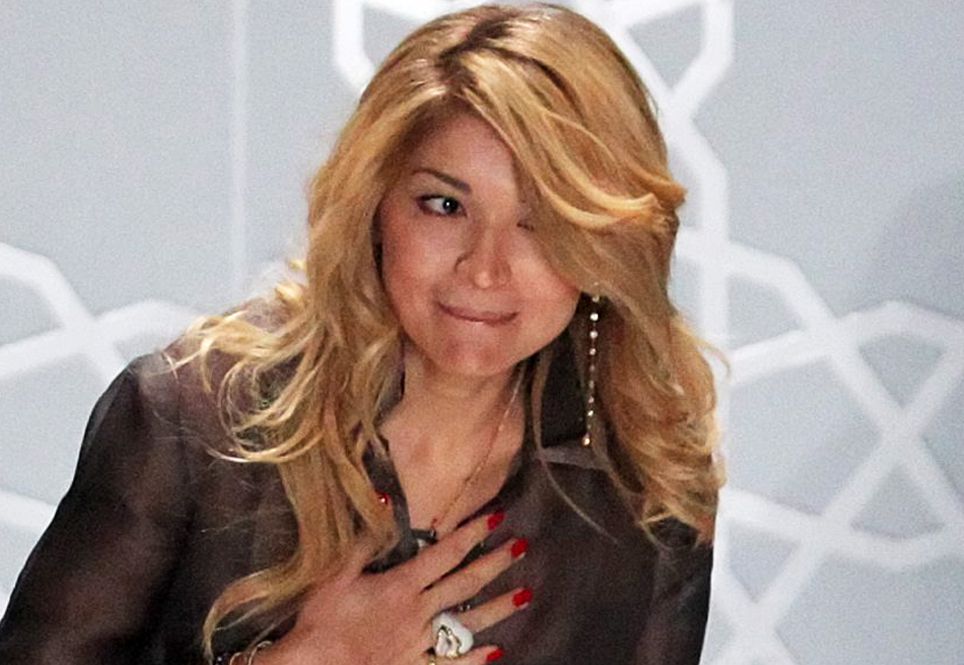 2011-04-02 17:49:51 epa02666831 Gulnara Karimova (C), daughter of Uzbek President Uzbek President Islam Karimov, takes the applause after showing her brand GULI at the Mercedes-Benz Fashion Week Russia Fall-Winter 2011/12, in Moscow, Russia, 02 April 2011. Gulnara Karimova is a Doctor of political science, professor. Currently serves as Ambassador Extraordinary and Plenipotentiary of Uzbekistan to Spain and Permanent Representative of Uzbekistan to the United Nations Office and other International Organizations in Geneva. EPA/SERGEI ILNITSKY