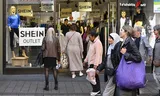 XR activists are dripping butyric acid over themselves in action against Fast Fashion in Nijmegen