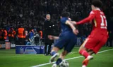 PSG coach Luis Enrique is watching Liverpool in the Champions League match. 
