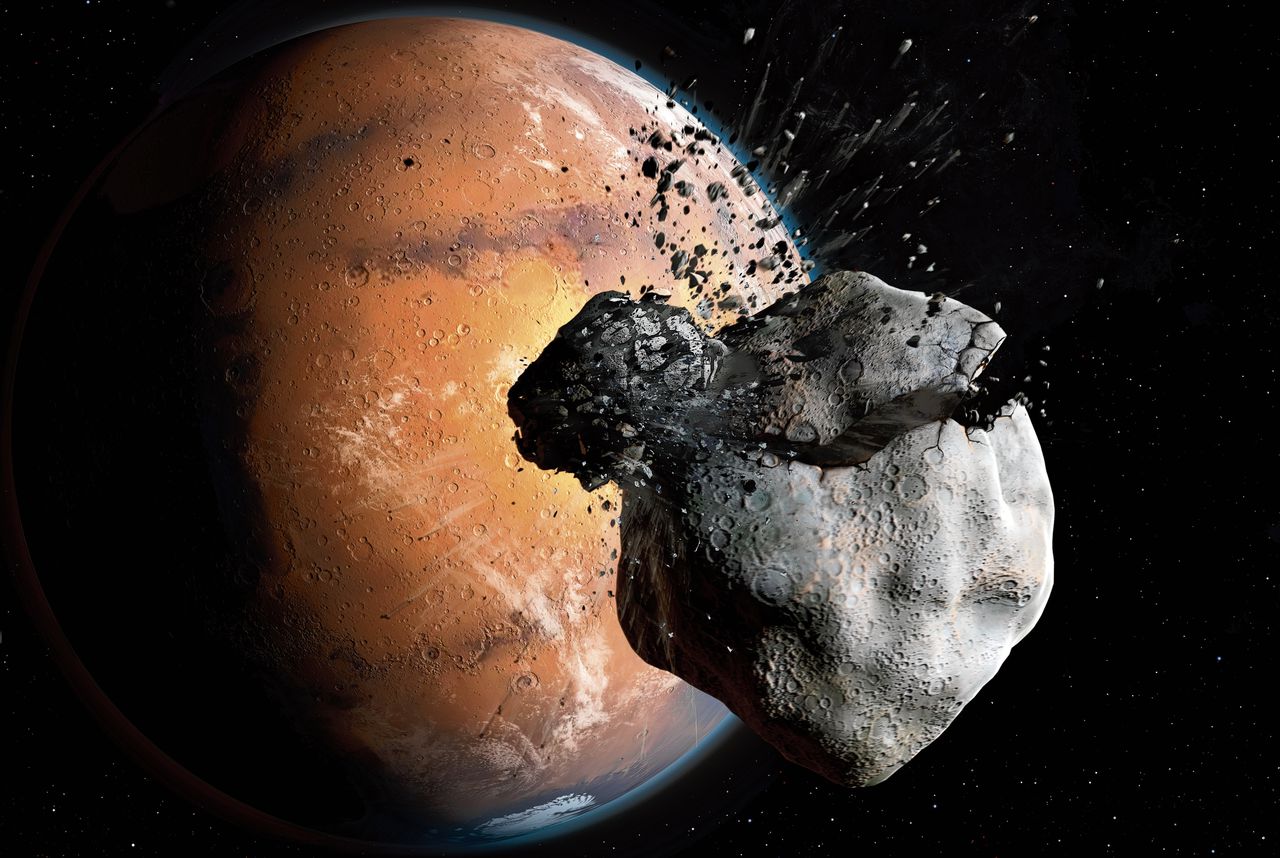 Phobos en Deimos zijn mogelijk ontstaan doordat een grotere maan werd getroffen door een asteroïde.