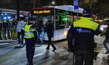 Later in the evening, the group at the convention center was taken away on buses with police escort.